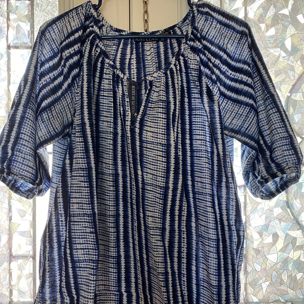 Medium woman’s navy and white blouse